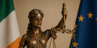 Bereaved Partner's Pension Statue of Lady Justice with Irish flag, symbolising new legislation for the Bereaved Partner’s Pension.
