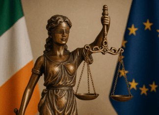 Bereaved Partner's Pension Statue of Lady Justice with Irish flag, symbolising new legislation for the Bereaved Partner’s Pension.