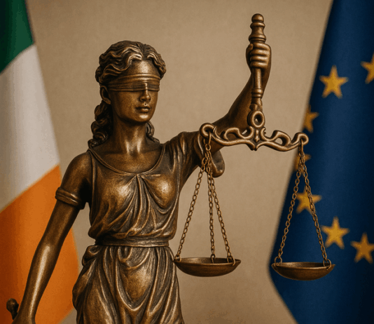 Bereaved Partner's Pension Statue of Lady Justice with Irish flag, symbolising new legislation for the Bereaved Partner’s Pension.