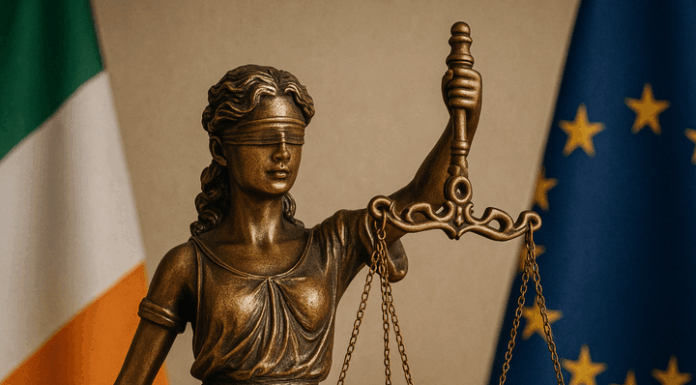 Bereaved Partner's Pension Statue of Lady Justice with Irish flag, symbolising new legislation for the Bereaved Partner’s Pension.